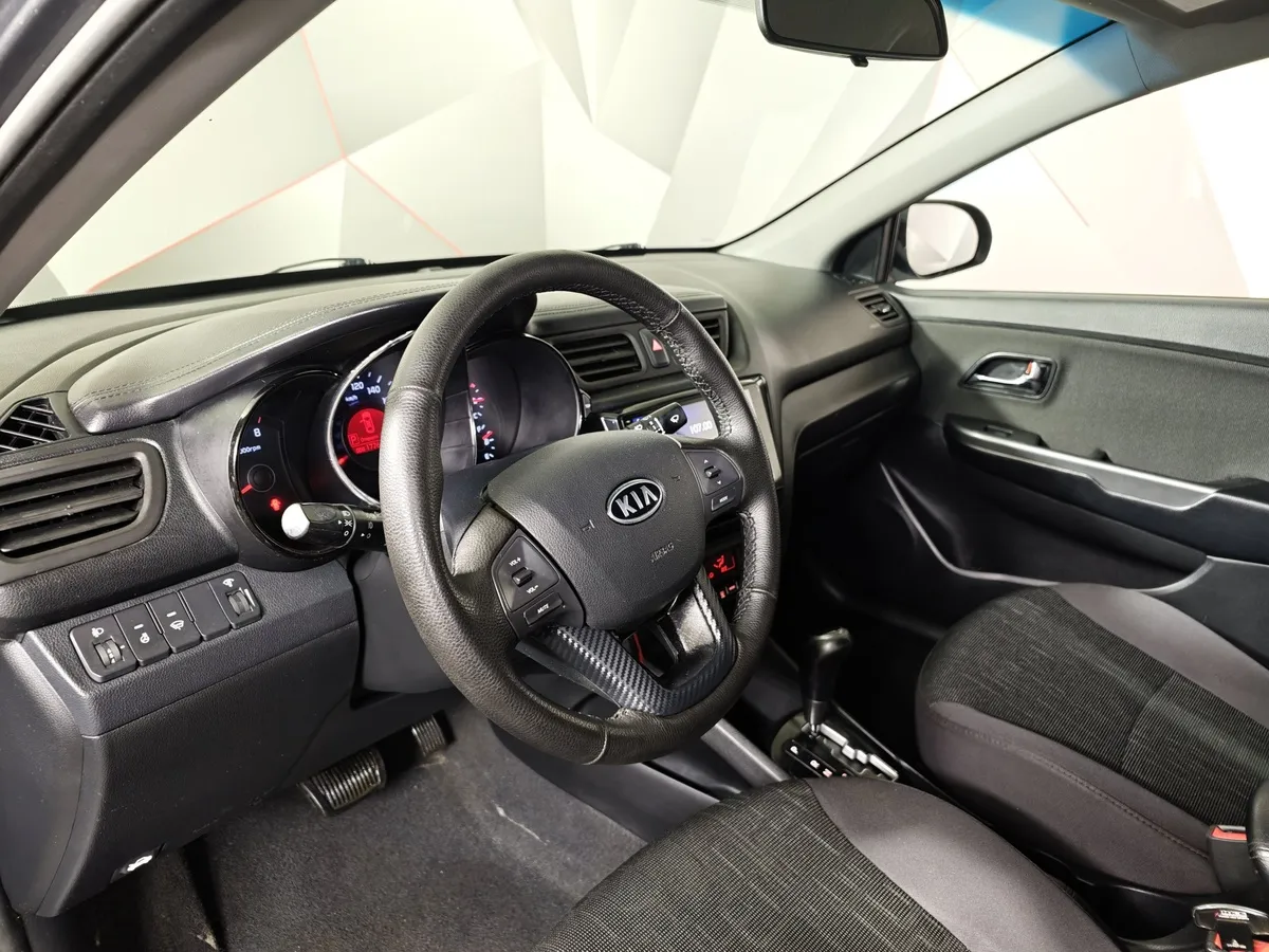 Kia Rio 1.6 AT (123 л.с.) Серый в АВИЛОН. Слайд №16