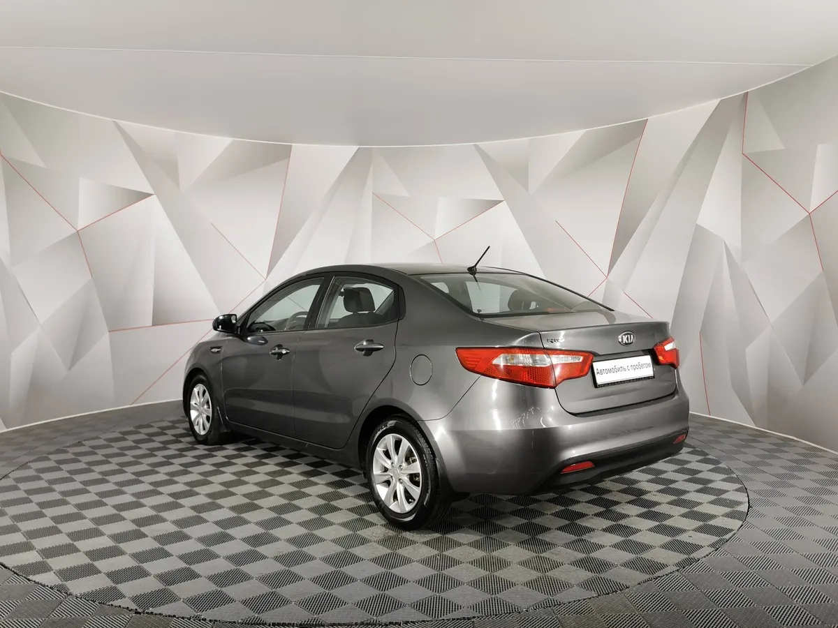 Kia Rio 1.4 AT (107 л.с.) Серый в АВИЛОН. Слайд №4