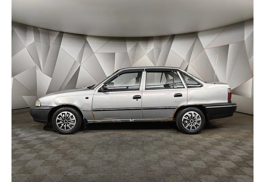 Daewoo Nexia 1.5 MT (75 л.с.) Серебристый в АВИЛОН. Слайд №5