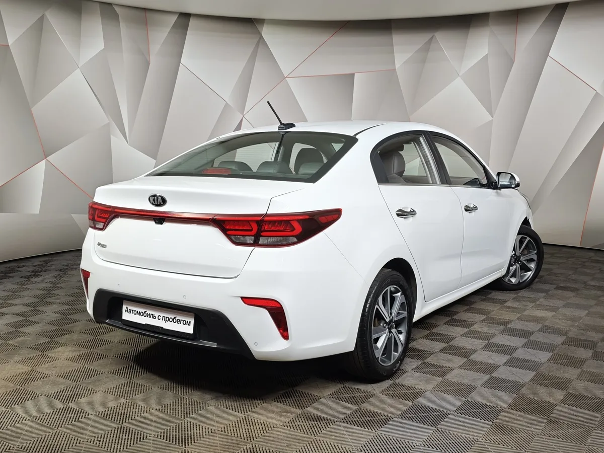 Kia Rio 1.6 AT (123 л.с.) Белый в АВИЛОН. Слайд №2