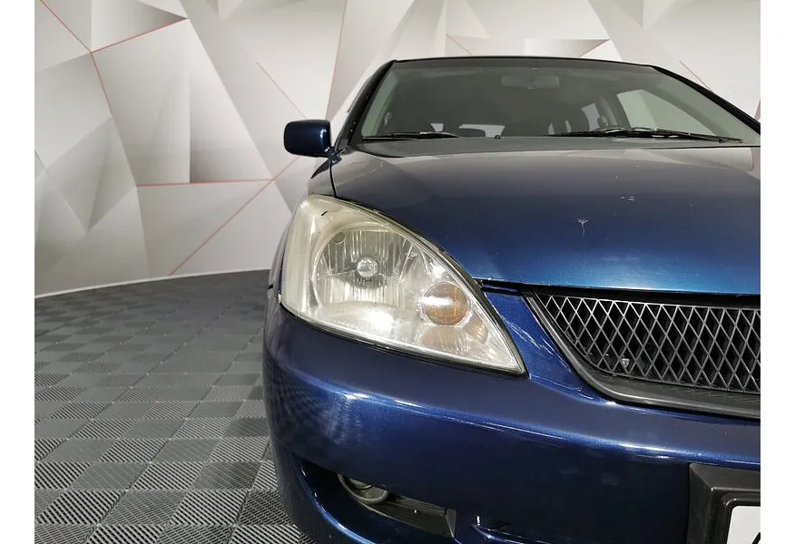 Mitsubishi Lancer 1.6 AT (98 л.с.) Синий в АВИЛОН. Слайд №19