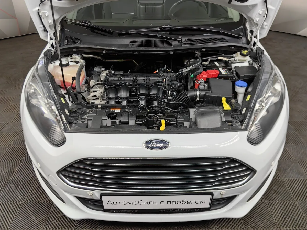 Ford Fiesta 1.4 MT (80 л.с.) Ghia Белый в АВИЛОН. Слайд №11