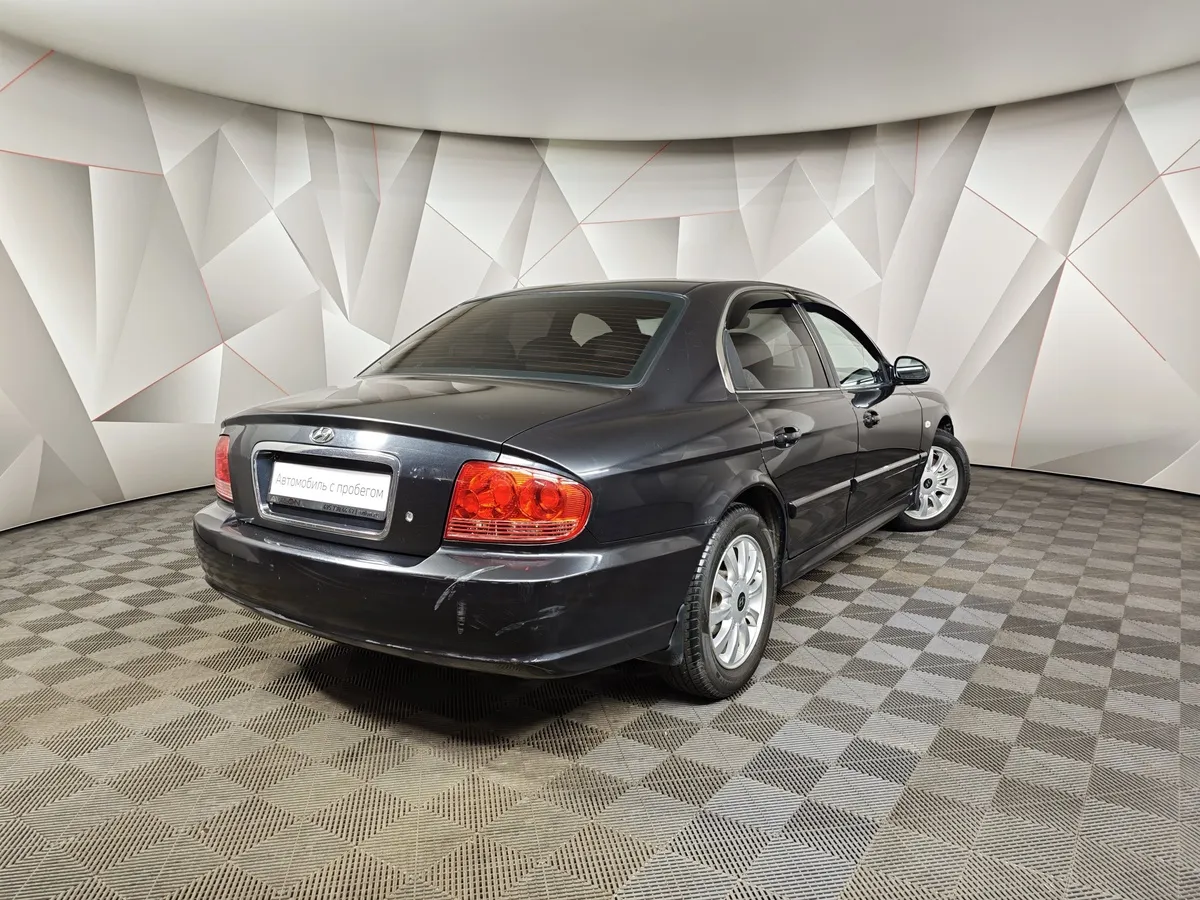 Hyundai Sonata 2.7 MT (172 л.с.) Черный в АВИЛОН. Слайд №2