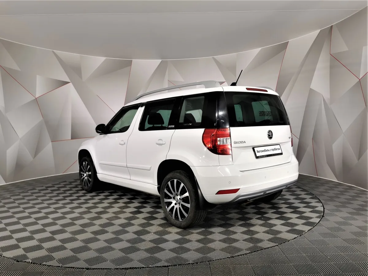 Skoda Yeti 1.6 AT (110 л.с.) Белый в АВИЛОН. Слайд №4