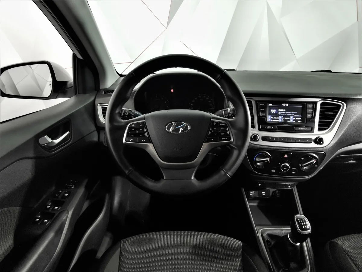 Hyundai Solaris 1.6 MT (123 л.с.) Comfort Белый в АВИЛОН. Слайд №19