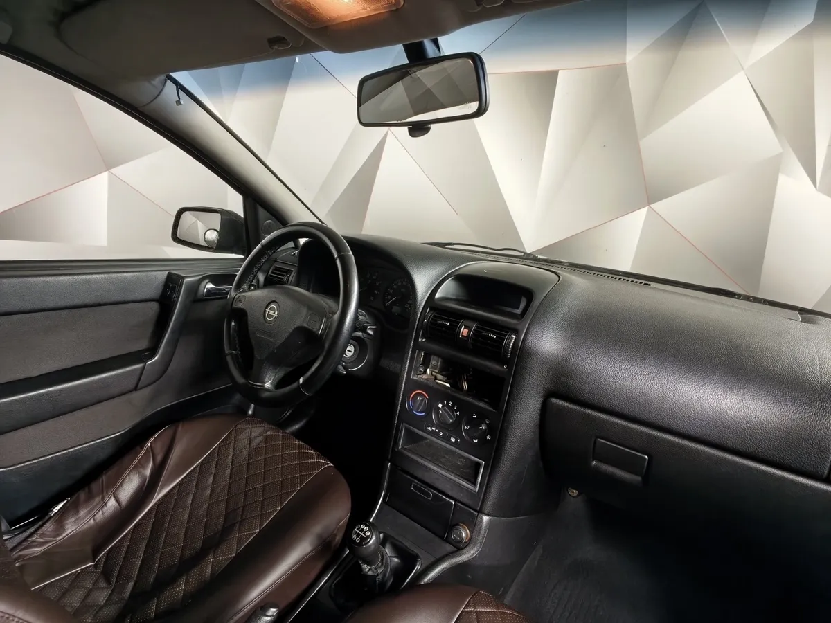 Opel Astra 1.6 Easytronic (115 л.с.) base в АВИЛОН. Слайд №12
