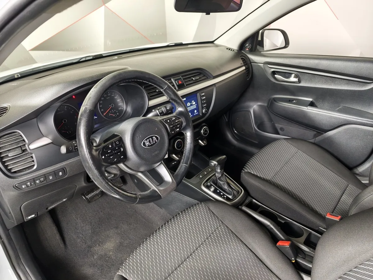 Kia Rio 1.6 AT (123 л.с.) Белый в АВИЛОН. Слайд №19