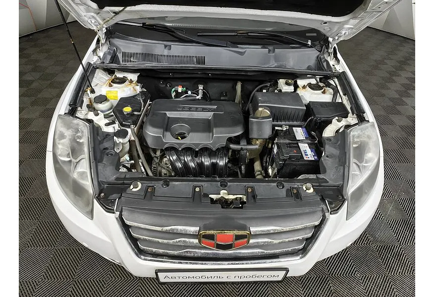 Geely Emgrand X7 2.0 MT (139 л.с.) Белый в АВИЛОН. Слайд №9