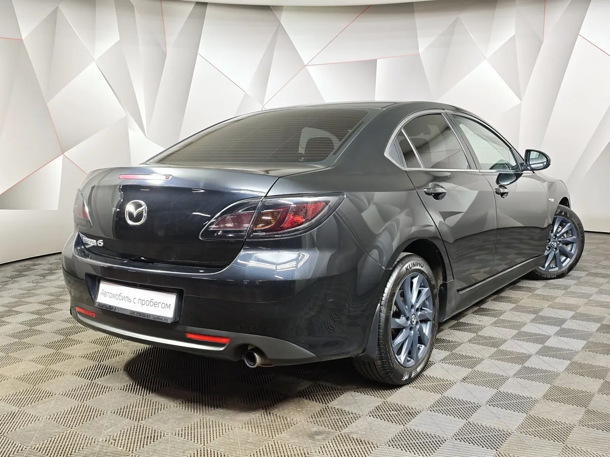 Mazda 6 1.8 MT (120 л.с.) Черный в АВИЛОН. Слайд №2
