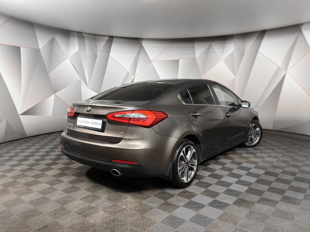 Kia Cerato 1.6 AT (130 л.с.) Бежевый в АВИЛОН. Слайд №2