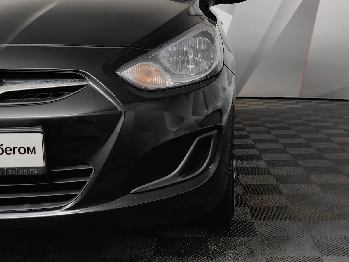 Hyundai Solaris 1.6 MT (123 л.с.) Optima Черный в АВИЛОН. Слайд №10
