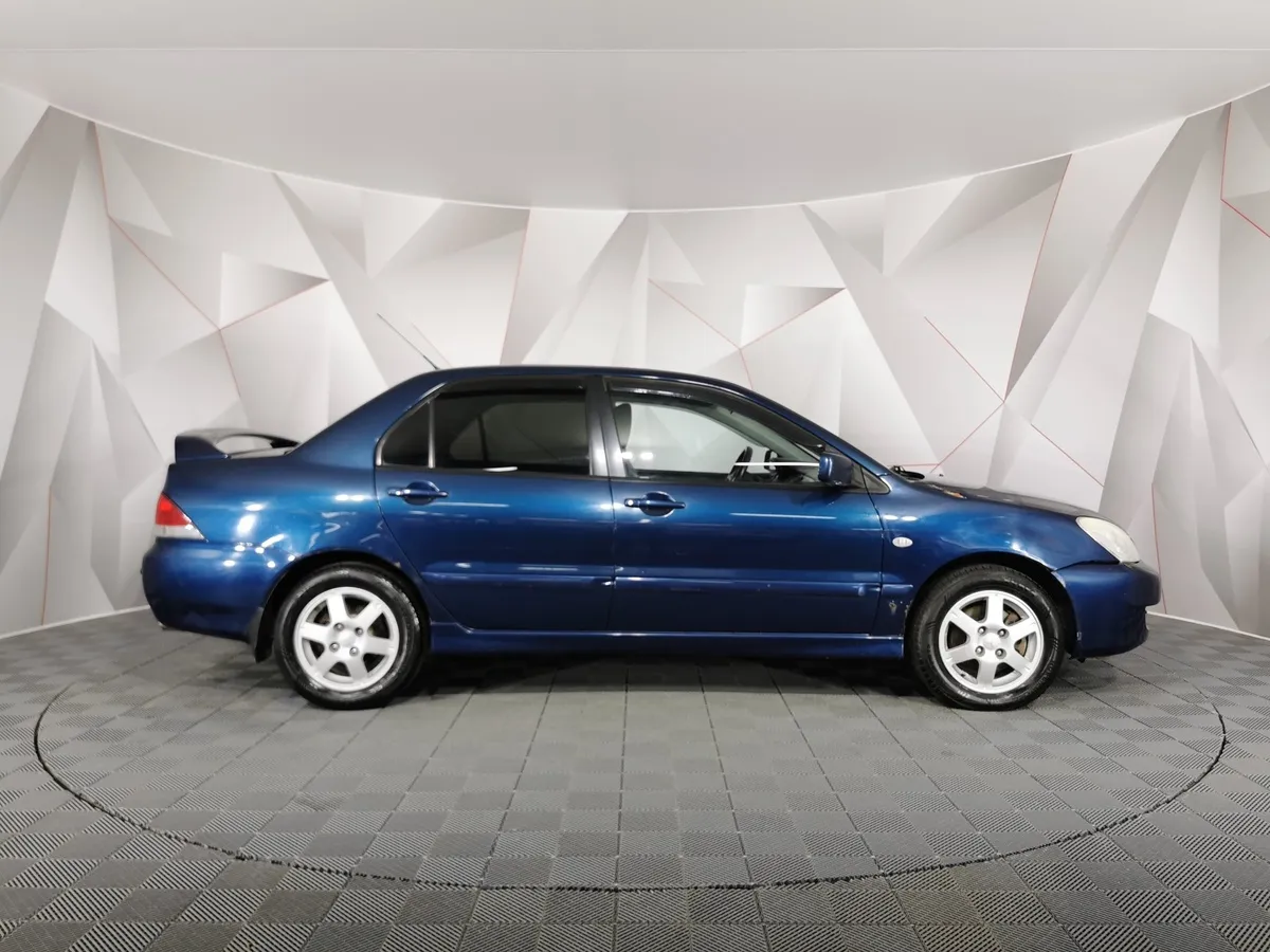 Mitsubishi Lancer 1.6 MT (100 л.с.) Синий в АВИЛОН. Слайд №6
