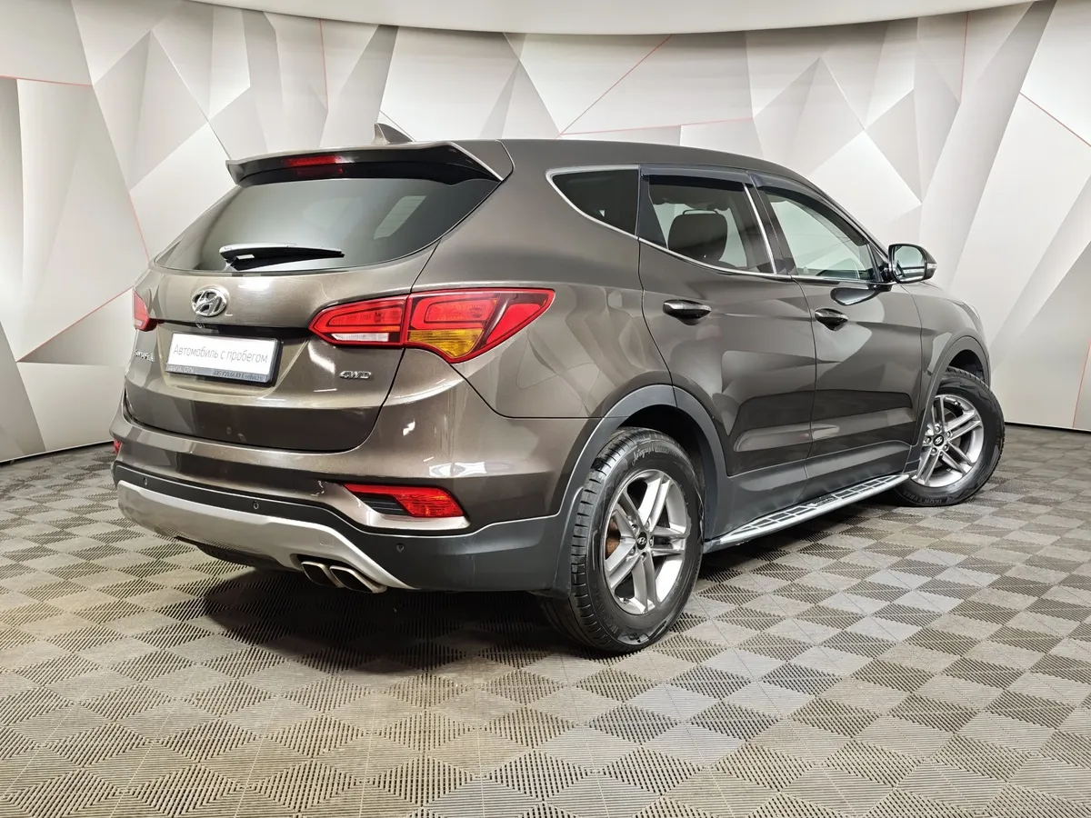 Hyundai Santa Fe 2.4 AT 4WD (175 л.с.) Comfort Коричневый в АВИЛОН. Слайд №2