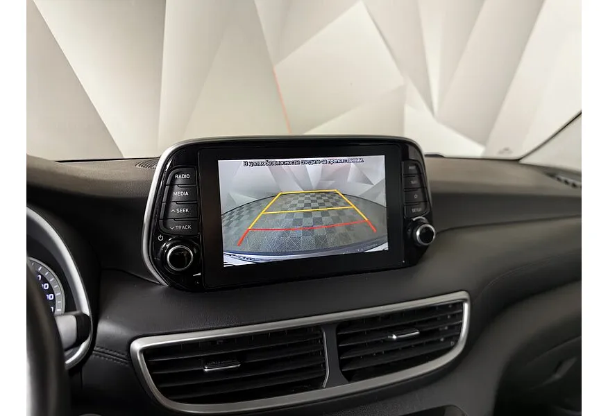 Hyundai Tucson 2.0 CRDi AT 4WD (185 л.с.) High-Tech Коричневый в АВИЛОН. Слайд №21