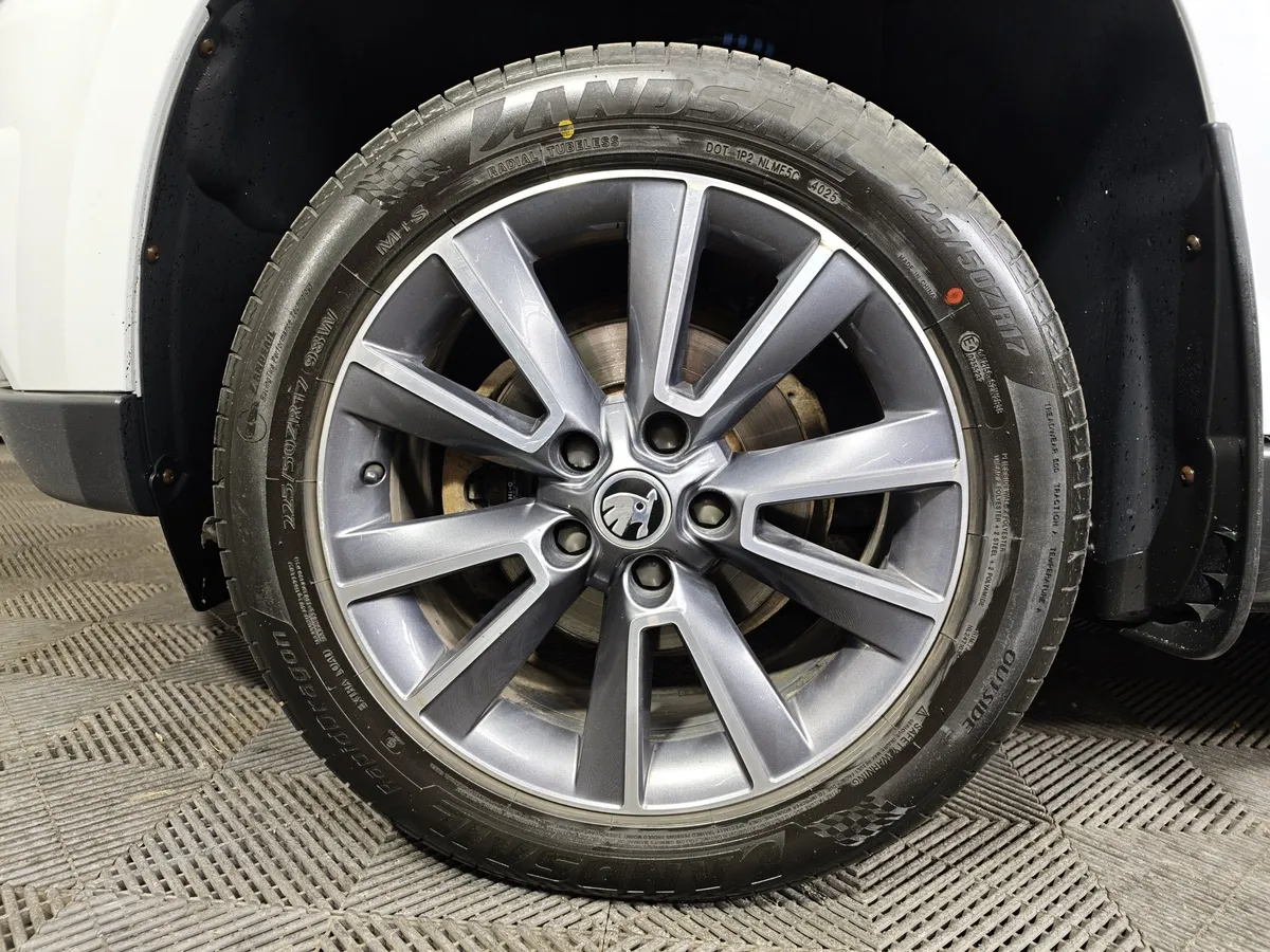 Skoda Yeti 1.6 AT (110 л.с.) Белый в АВИЛОН. Слайд №9