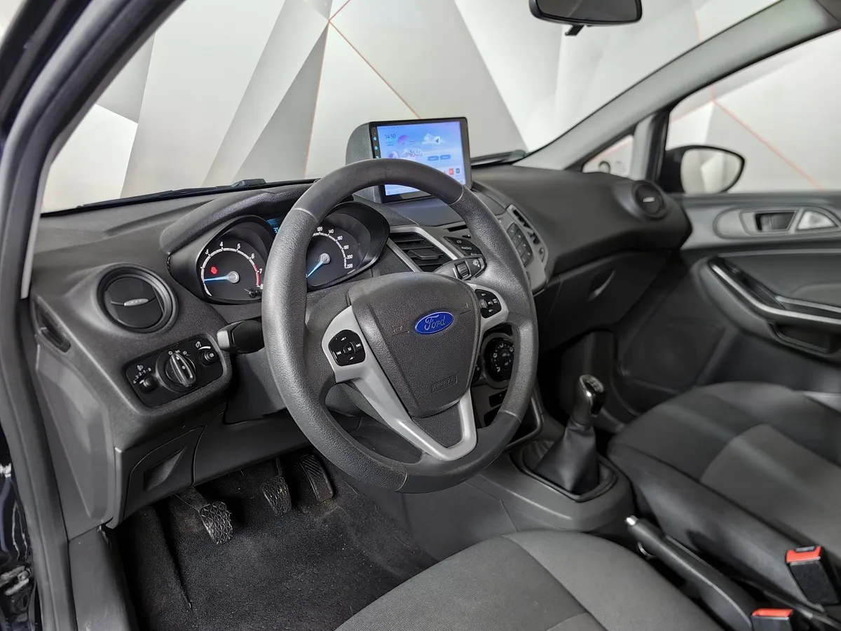 Ford Fiesta 1.6 Ti-VCT MT (85 л.с.) Ambiente Черный в АВИЛОН. Слайд №19