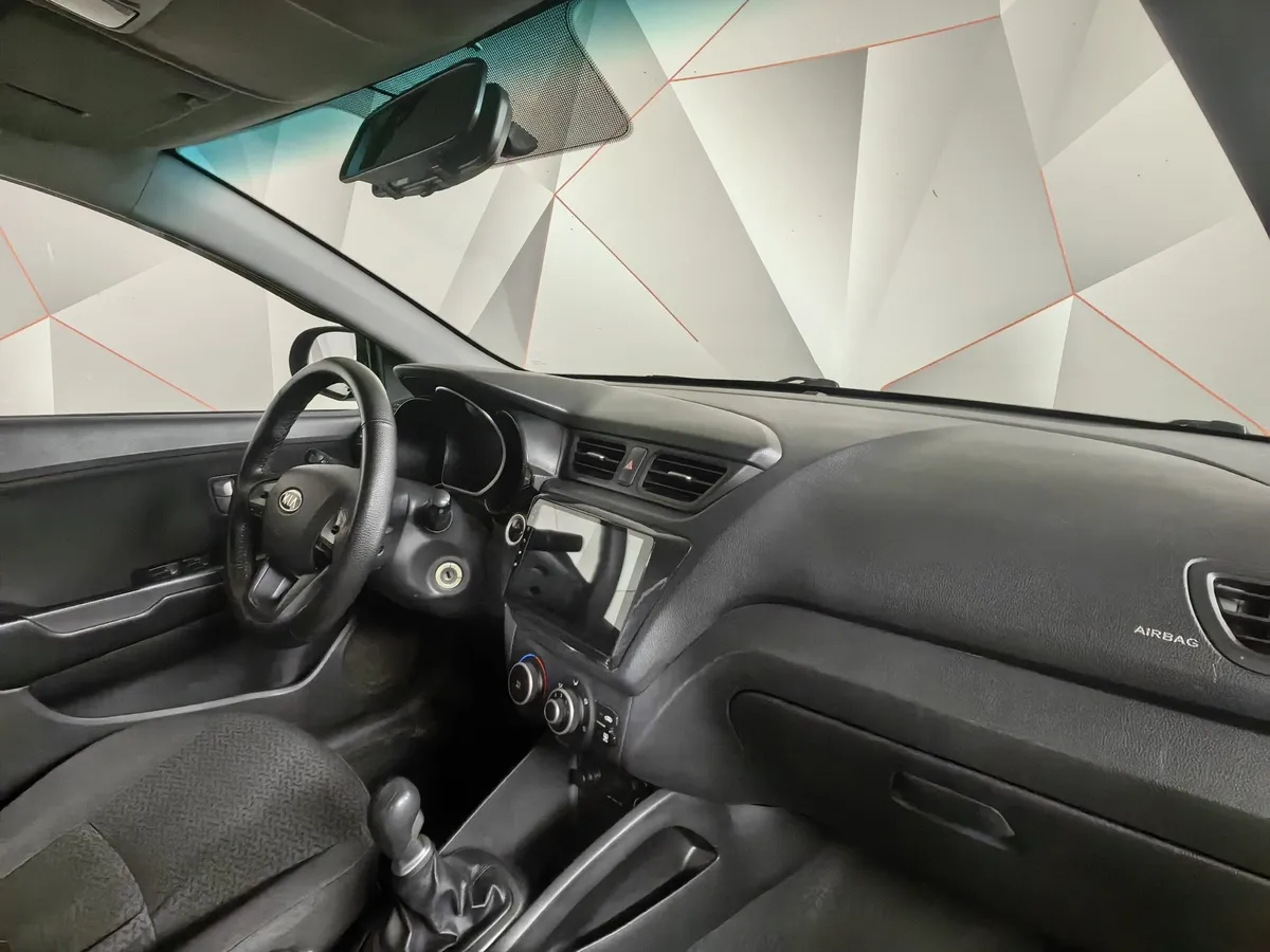 Kia Rio 1.4 MT (107 л.с.) Comfort Черный в АВИЛОН. Слайд №11