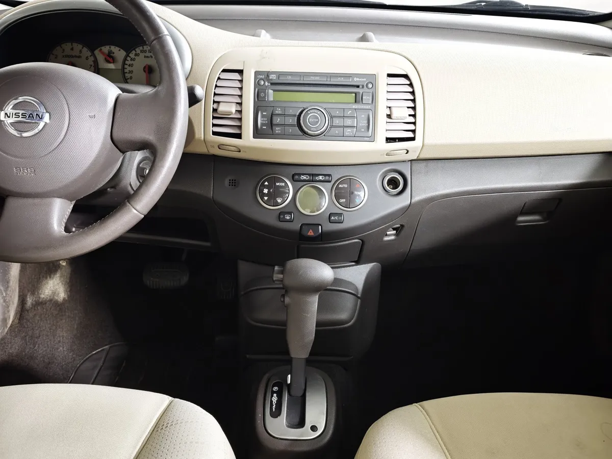 Nissan Micra 1.4 AT (88 л.с.) Черный в АВИЛОН. Слайд №14