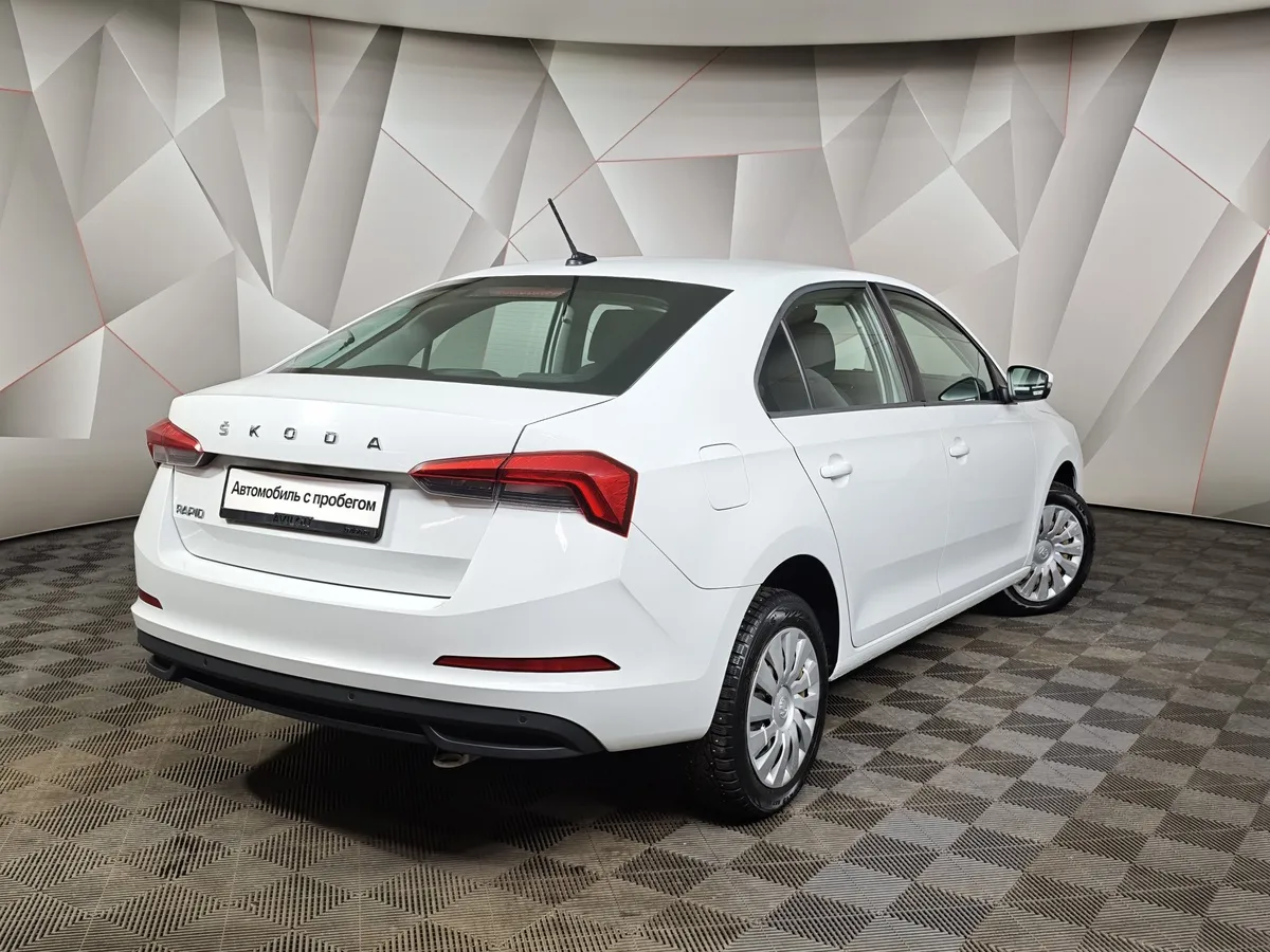 Skoda Rapid 1.6 AT (110 л.с.) Белый в АВИЛОН. Слайд №2