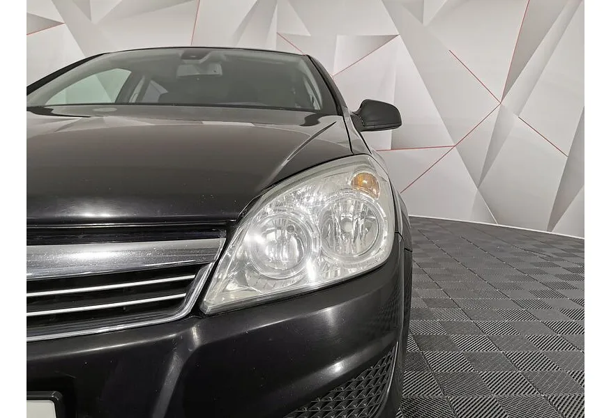 Opel Astra 1.8 AT (140 л.с.) Черный в АВИЛОН. Слайд №10