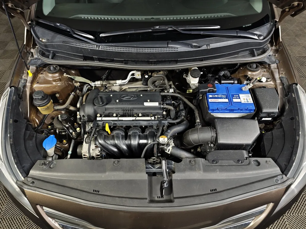 Hyundai Solaris 1.6 AT (123 л.с.) Classic + AC Коричневый в АВИЛОН. Слайд №11