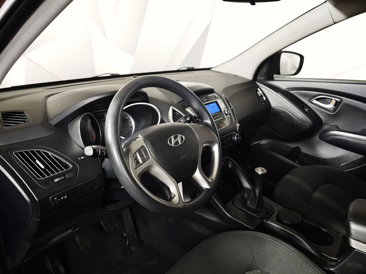 Hyundai ix35 2.0 MT 2WD (150 л.с.) Classic Коричневый в АВИЛОН. Слайд №19