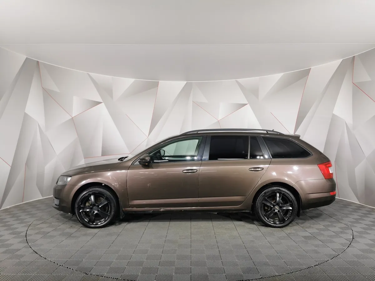 Skoda Octavia 1.8 TSI DSG 4x4 (180 л.с.) Elegance Коричневый в АВИЛОН. Слайд №5