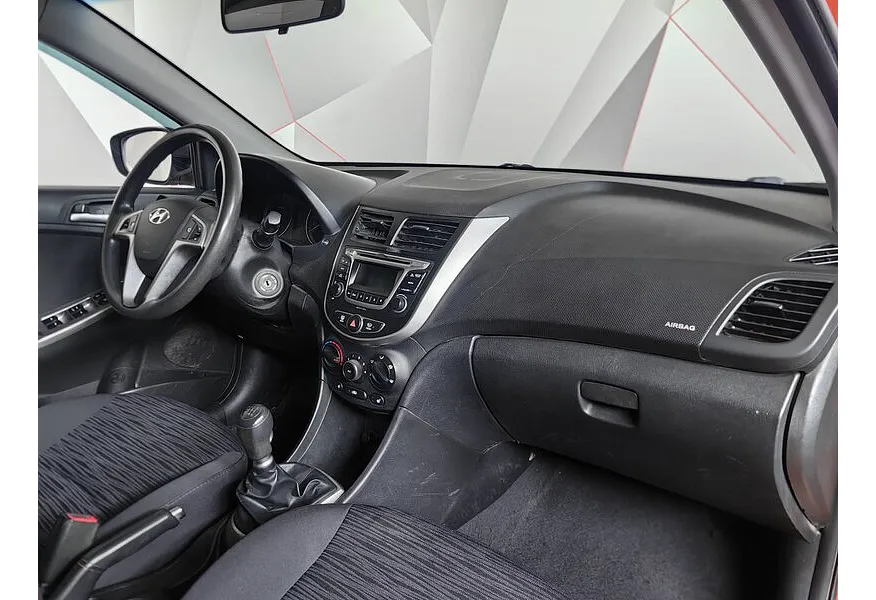 Hyundai Solaris 1.6 MT (123 л.с.) Comfort Оранжевый в АВИЛОН. Слайд №13 Hyundai Solaris 1.6 MT (123 л.с.) Comfort Оранжевый в АВИЛОН. Слайд №13