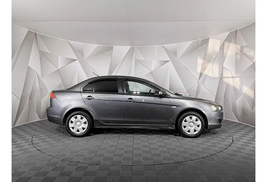 Mitsubishi Lancer 1.8 MT (143 л.с.) Серый в АВИЛОН. Слайд №6