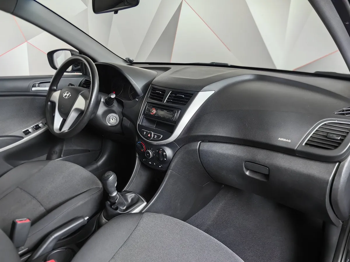 Hyundai Solaris 1.4 MT (107 л.с.) Active Черный в АВИЛОН. Слайд №13