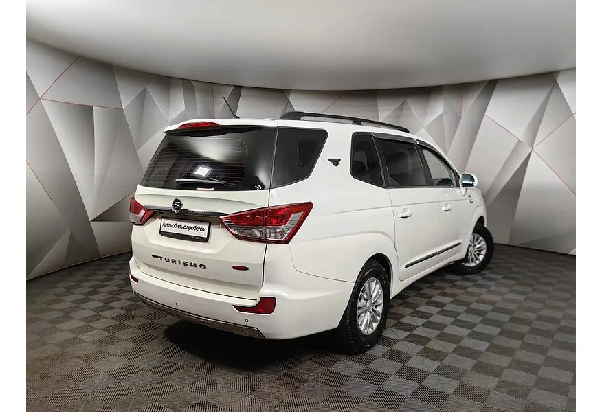 SsangYong Korando Turismo 2.2d AT 4WD (178 л.с.) Белый в АВИЛОН. Слайд №2