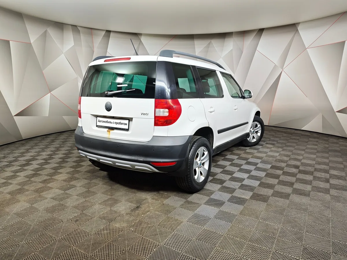 Skoda Yeti 1.2 TSI DSG (105 л.с.) Active Белый в АВИЛОН. Слайд №2