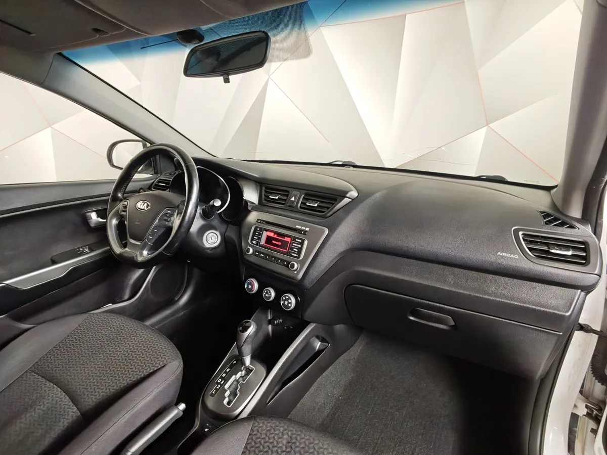 Kia Rio 1.4 AT (107 л.с.) Белый в АВИЛОН. Слайд №12