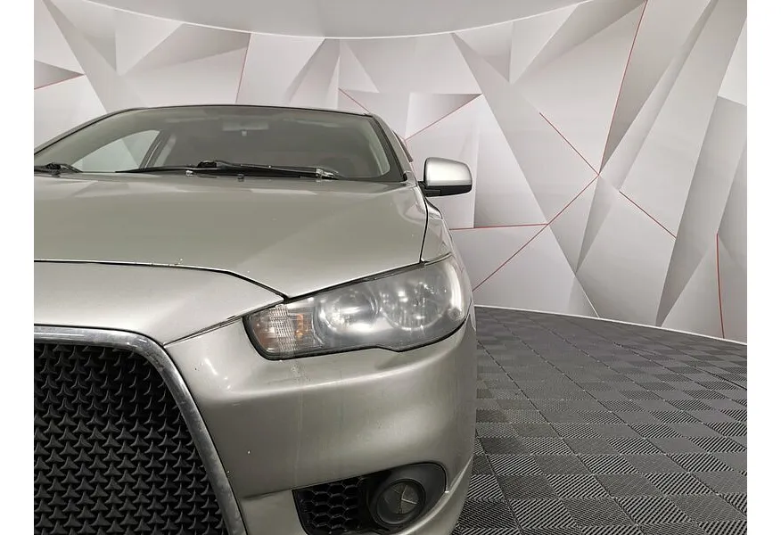 Mitsubishi Lancer 1.6 AT (117 л.с.) Серебристый в АВИЛОН. Слайд №10