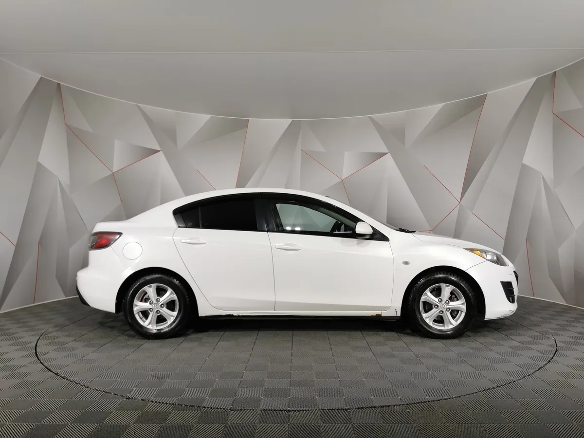 Mazda 3 1.6 AT (105 л.с.) Белый в АВИЛОН. Слайд №6