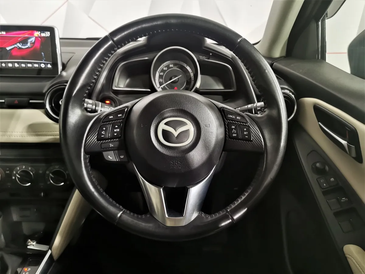 Mazda Demio 1.5d AT FWD (105 л.с.) Серый в АВИЛОН. Слайд №19