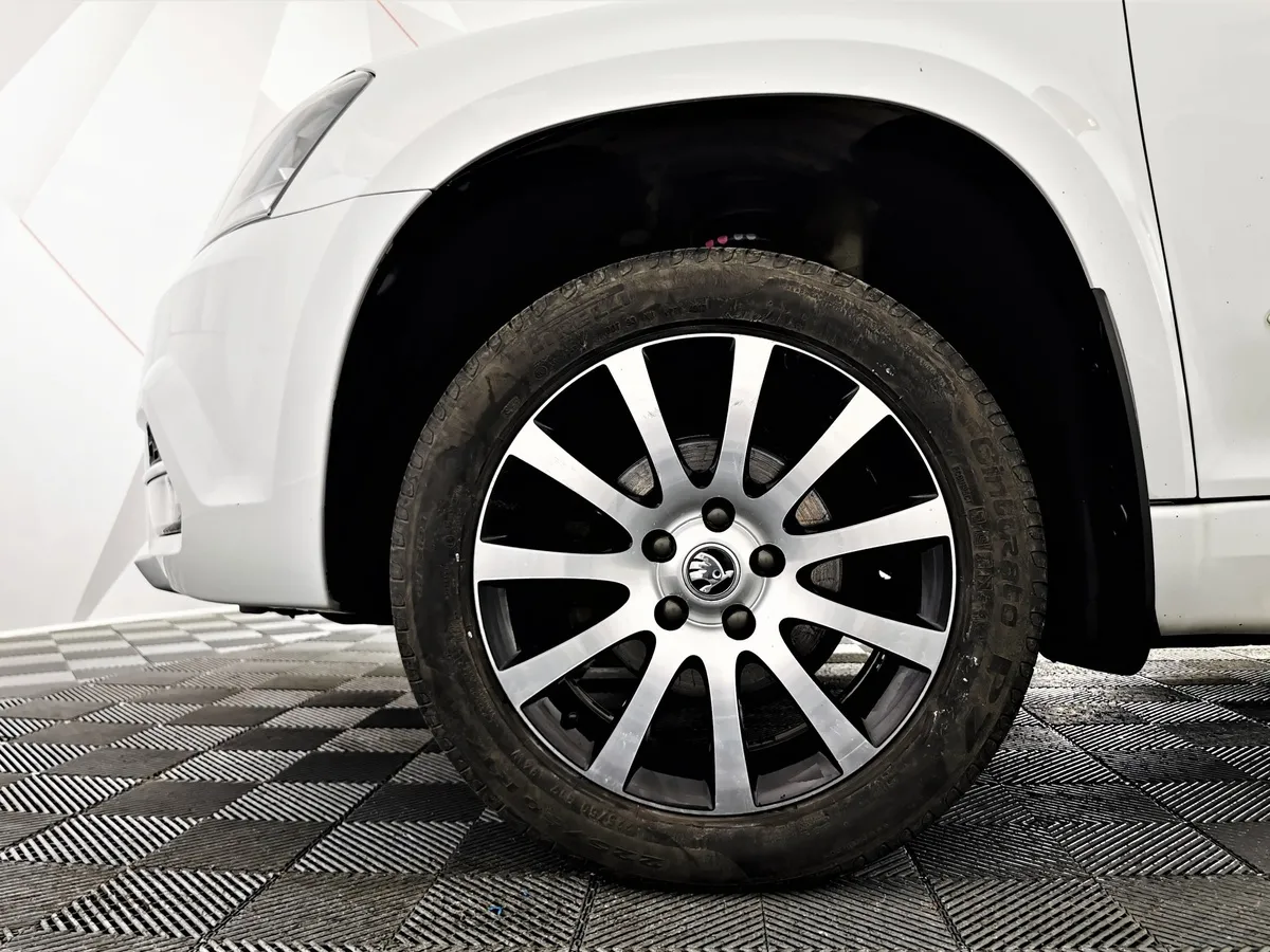 Skoda Yeti 1.6 AT (110 л.с.) Белый в АВИЛОН. Слайд №9