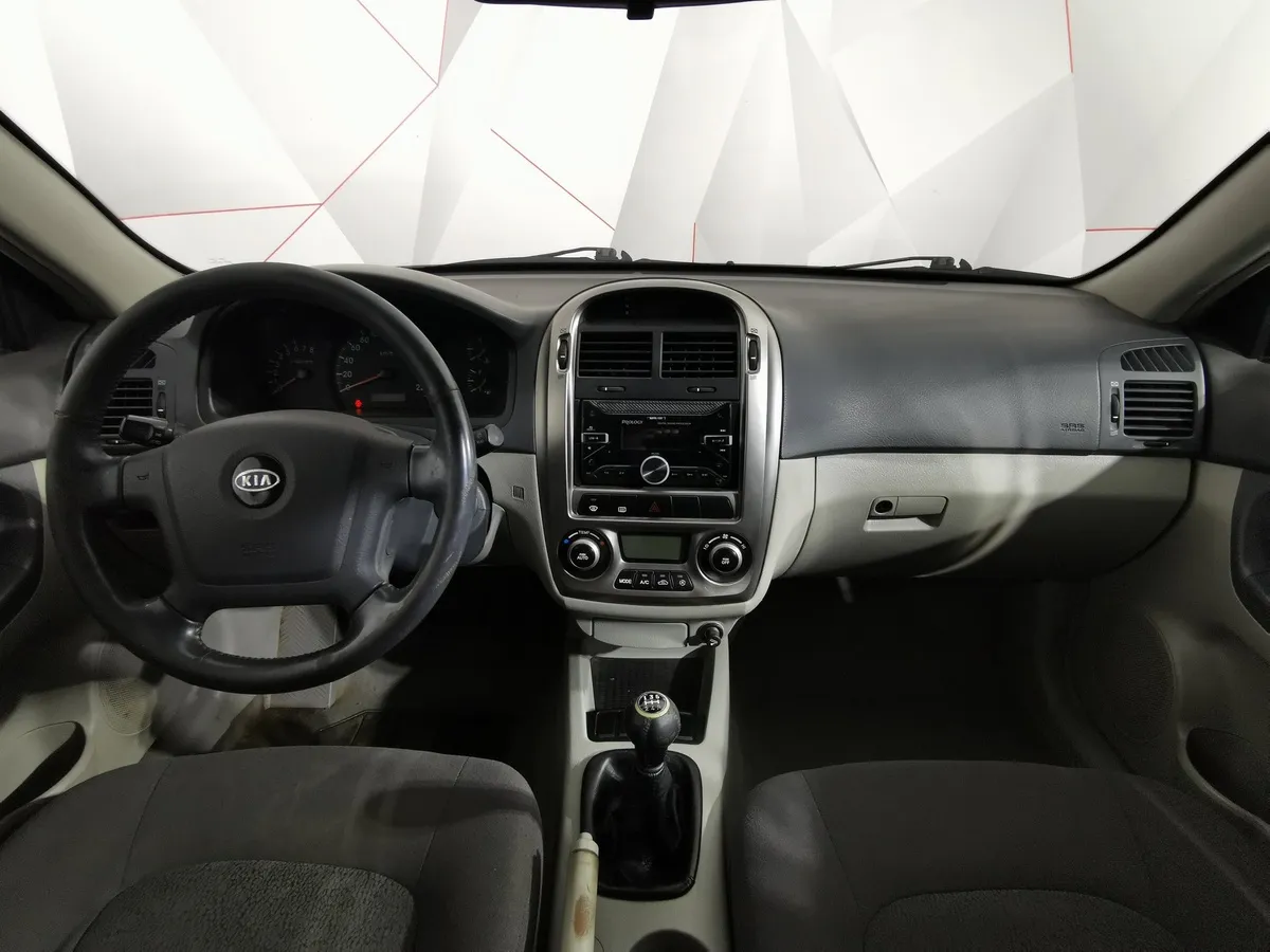 Kia Cerato 1.6 MT (105 л.с.) Серебристый в АВИЛОН. Слайд №12