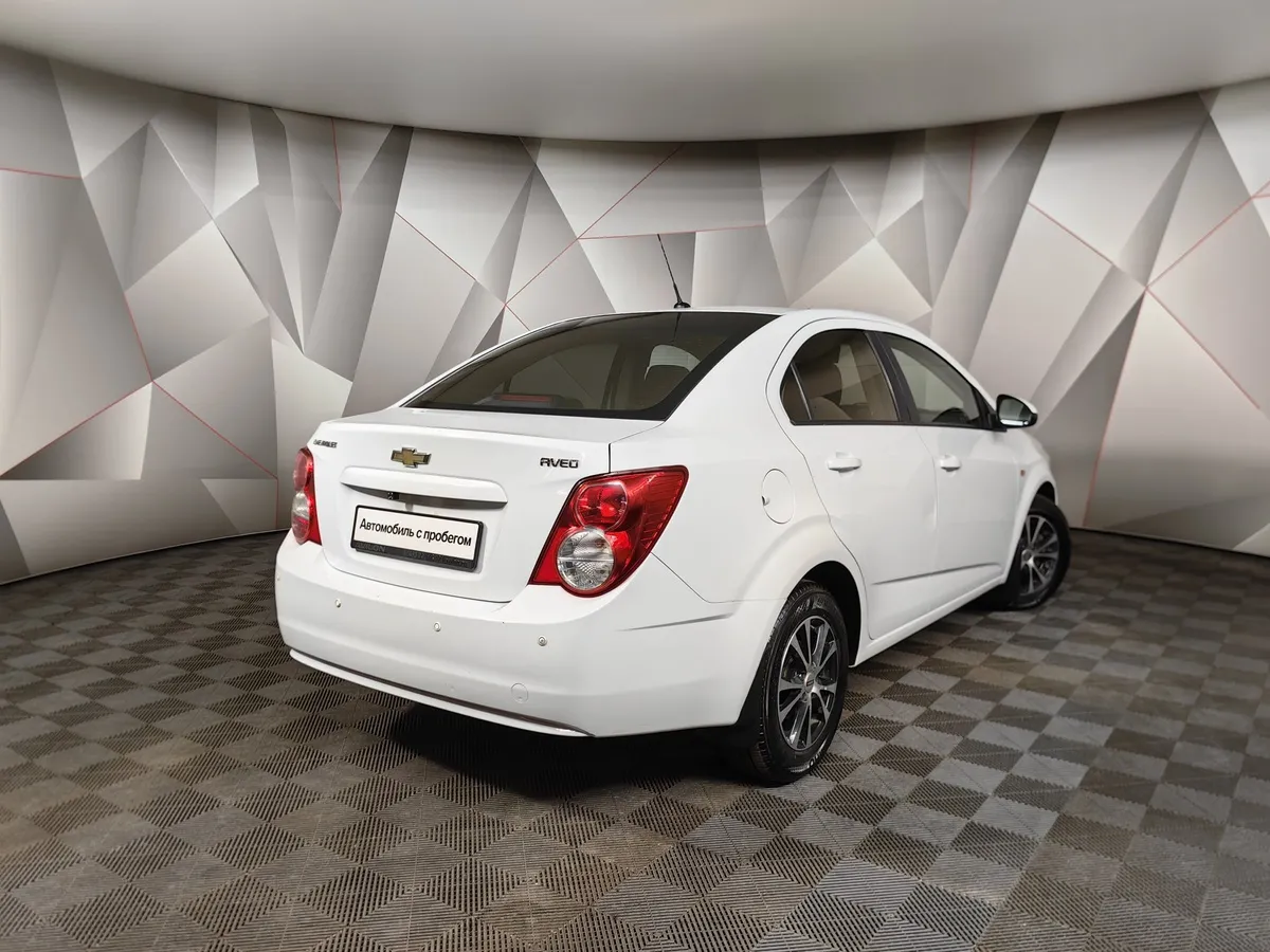 Chevrolet Aveo 1.6 AT (115 л.с.) Белый в АВИЛОН. Слайд №2