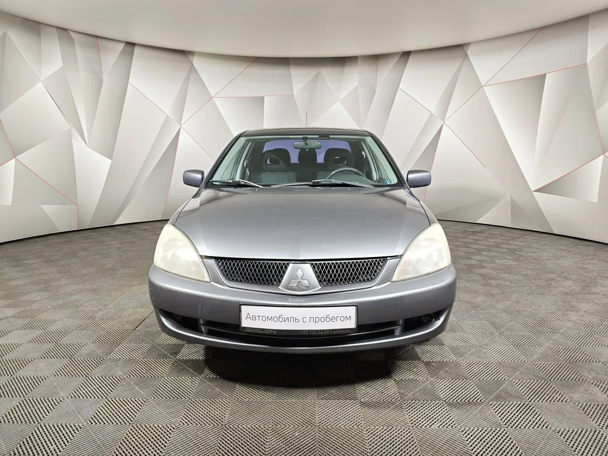 Mitsubishi Lancer 1.6 MT (100 л.с.) Серый в АВИЛОН. Слайд №7