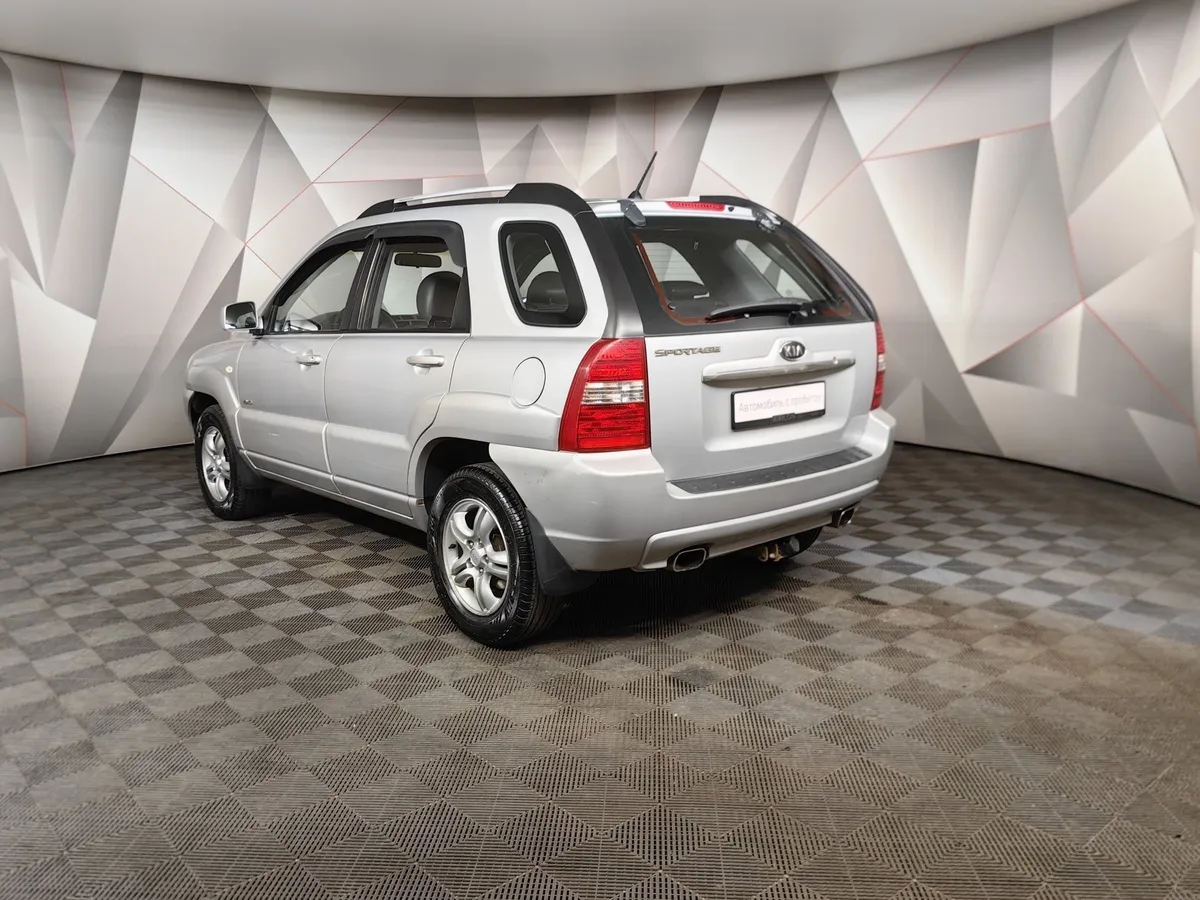 Kia Sportage 2.0 CRDi AT 4WD (112 л.с.) Серебристый в АВИЛОН. Слайд №4