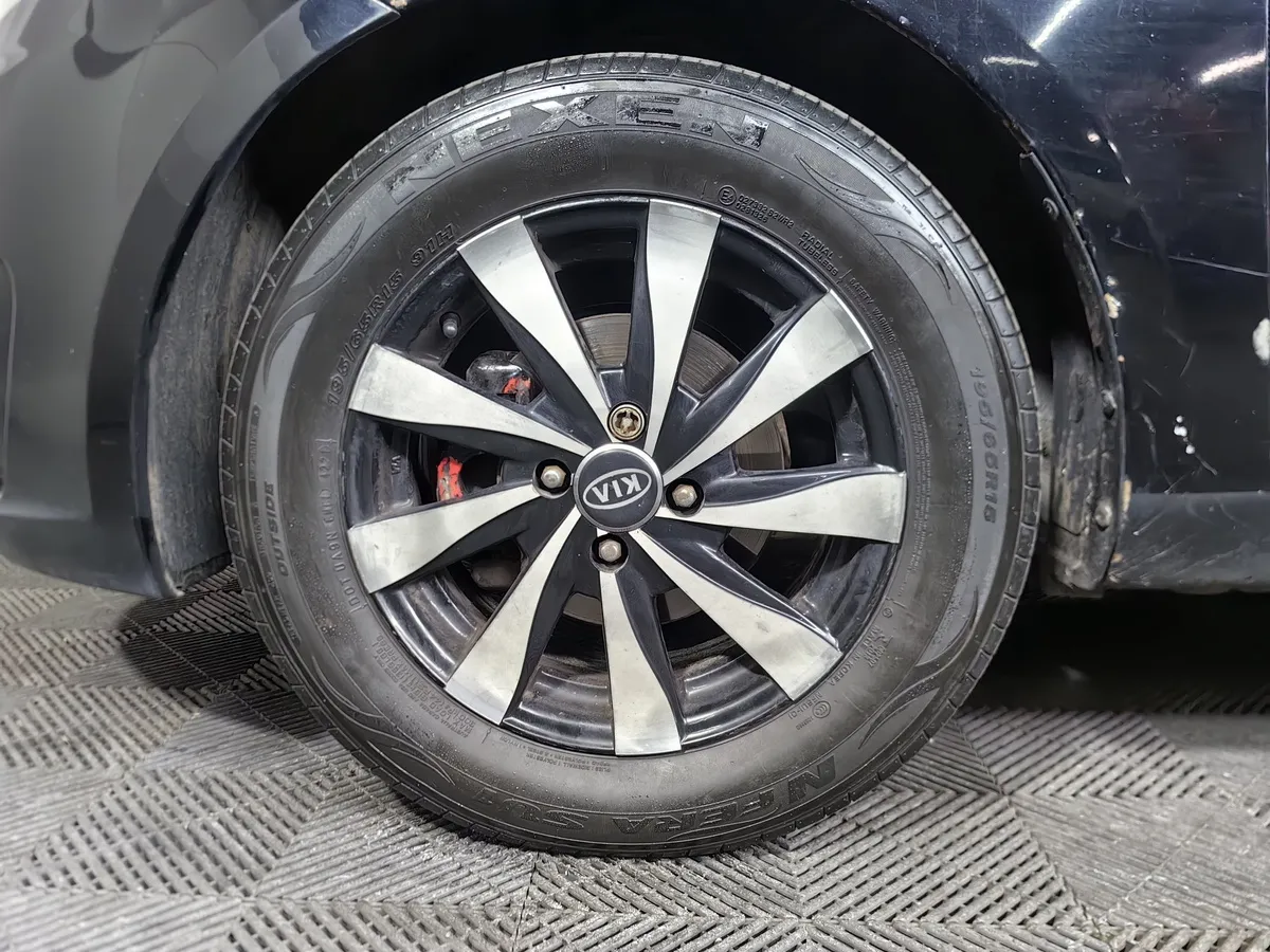 Kia Rio 1.4 MT (107 л.с.) Comfort Черный в АВИЛОН. Слайд №9