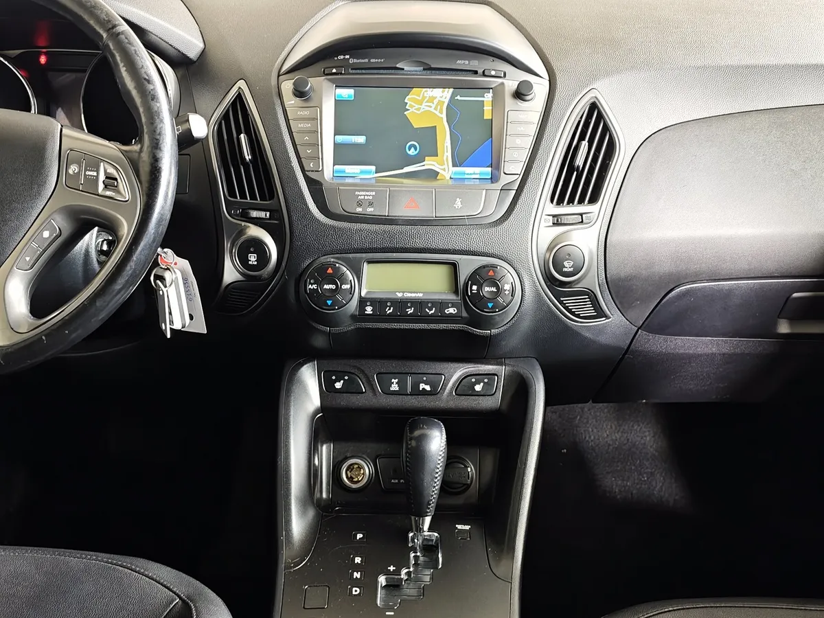Hyundai ix35 2.0 AT 4WD (150 л.с.) Travel Коричневый в АВИЛОН. Слайд №15