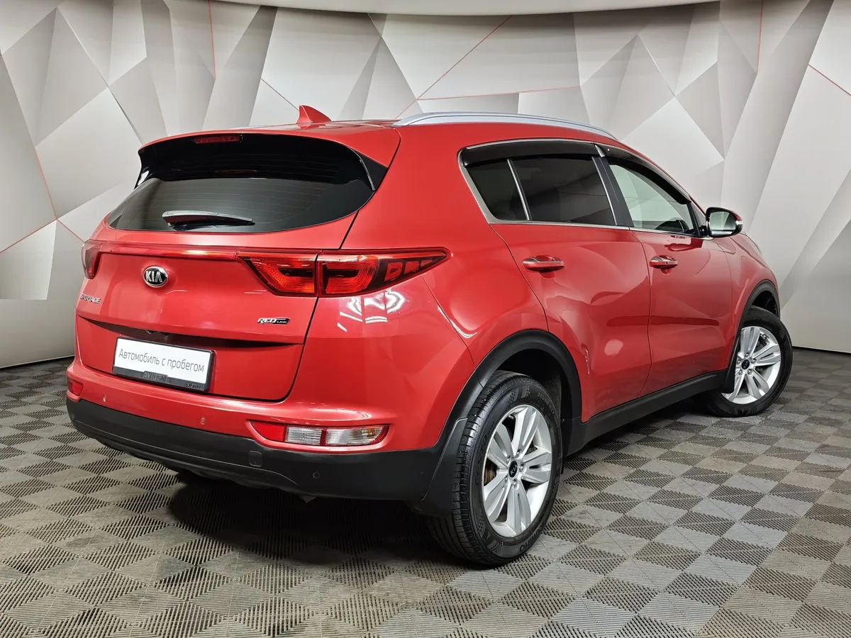 Kia Sportage 2.0 AT (150 л.с.) Красный в АВИЛОН. Слайд №2