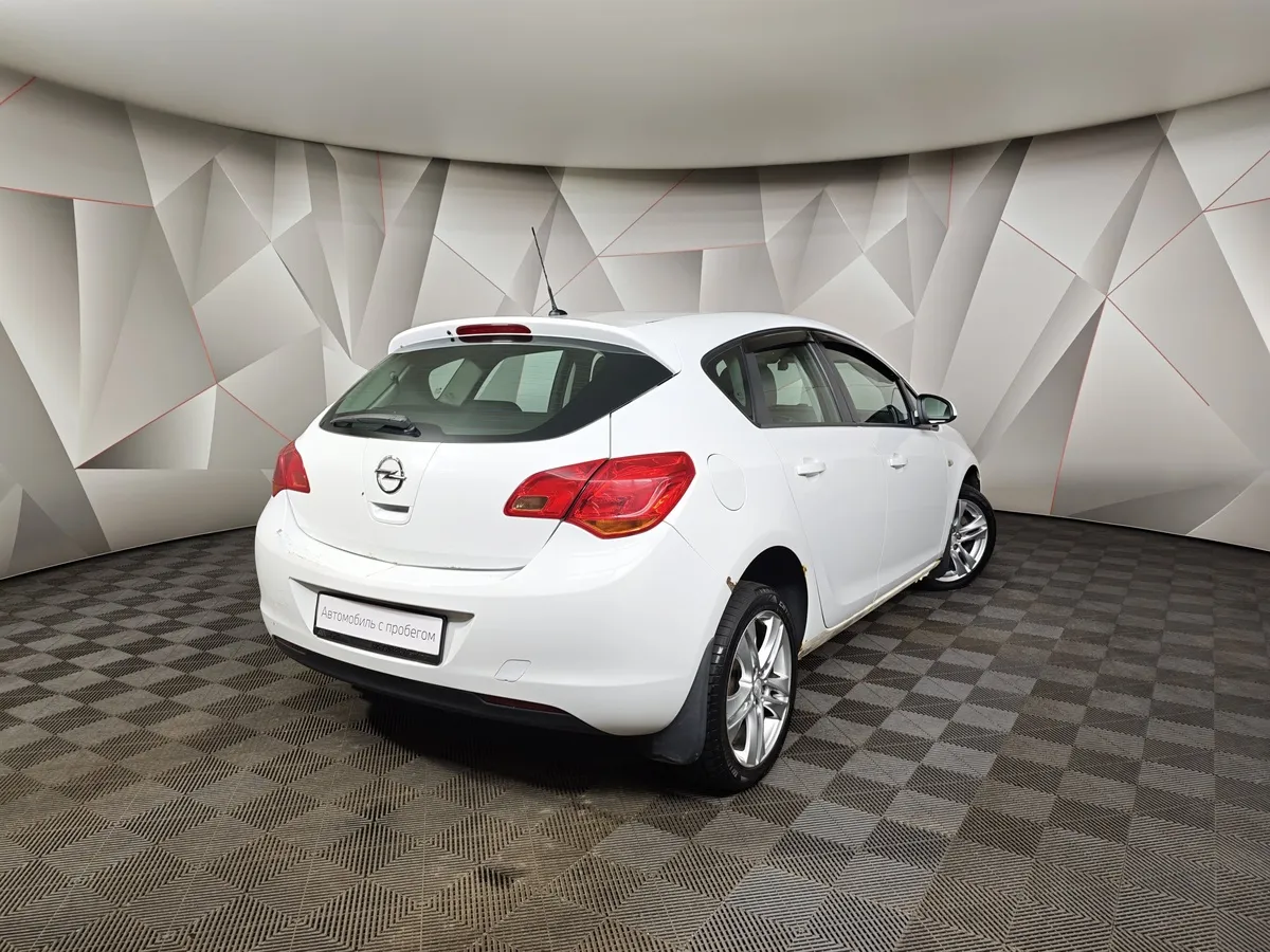 Opel Astra 1.6 AT (115 л.с.) Белый в АВИЛОН. Слайд №2