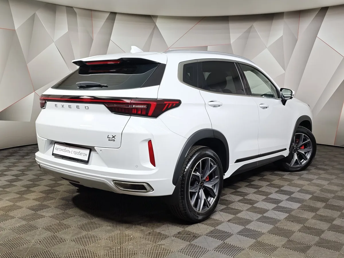 EXEED LX 1.6T DCT 4WD (150 л.с) Premium Plus Белый в АВИЛОН. Слайд №2