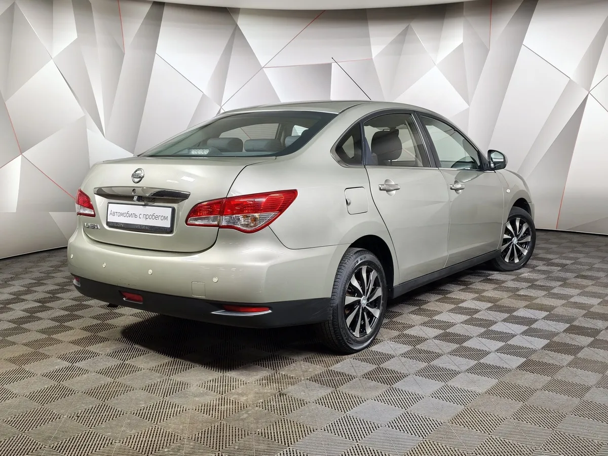 Nissan Almera 1.6 AT (102 л.с.) Comfort Бежевый в АВИЛОН. Слайд №2