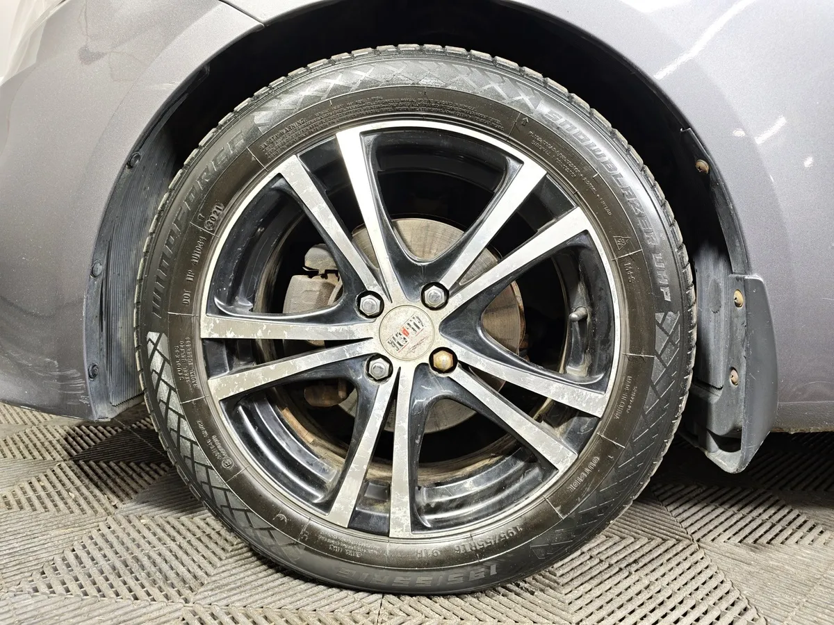 Kia Rio 1.6 AT (123 л.с.) Серый в АВИЛОН. Слайд №9