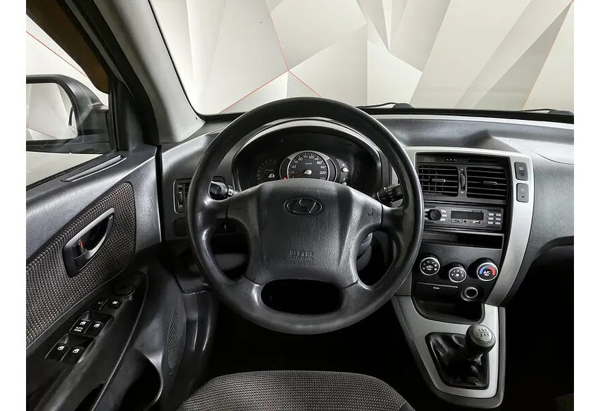 АВИЛОН - Hyundai Tucson 2.0 MT 4WD (140 л.с.) Серебристый - slide 14