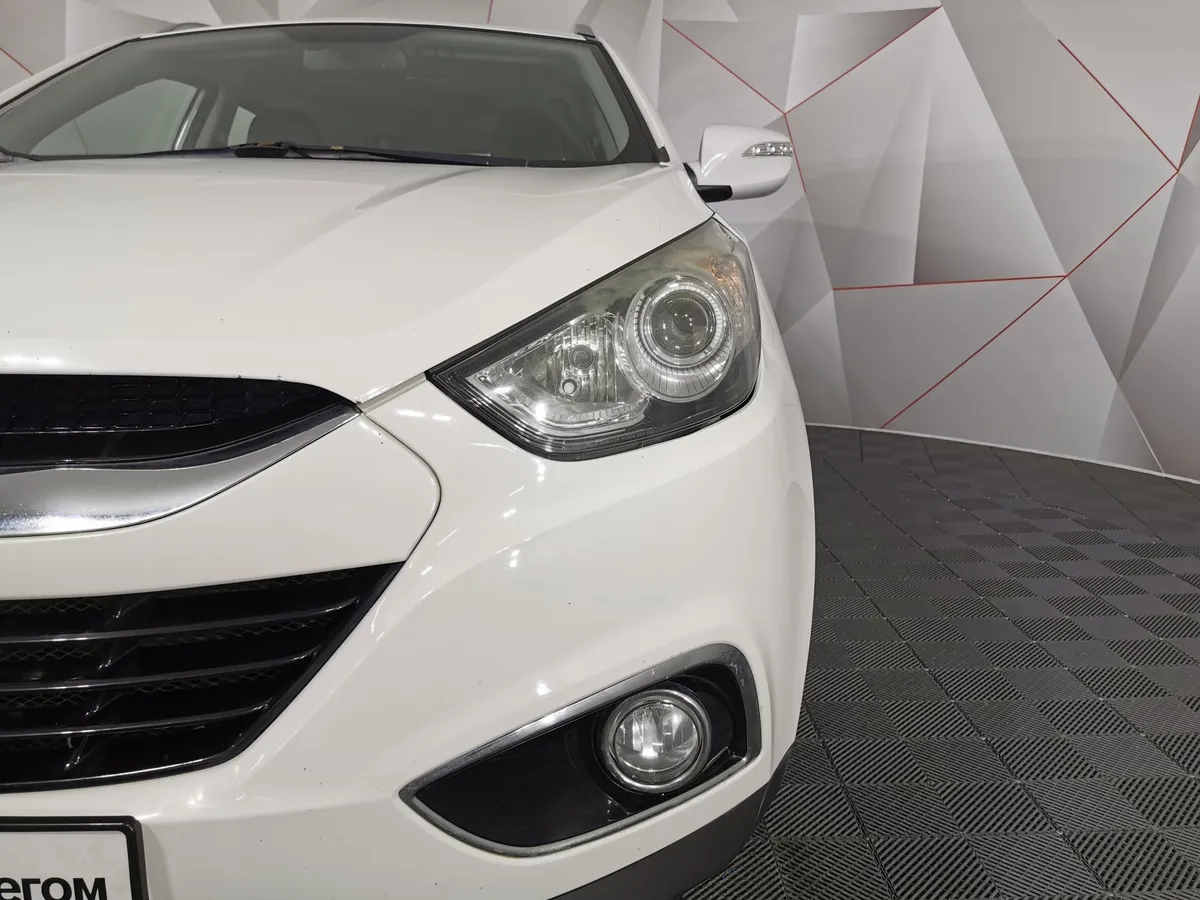 Hyundai ix35 2.0 AT 4WD (150 л.с.) Comfort + Navi Белый в АВИЛОН. Слайд №10